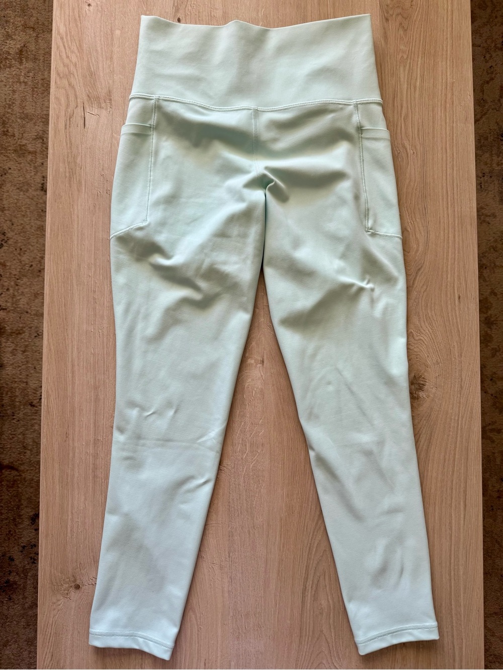 Athleta Light Turquoise Salutation Stash Pocket 7/8 Leggings